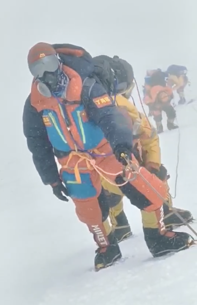 charolett Ding reaches the summit of Mount Everest